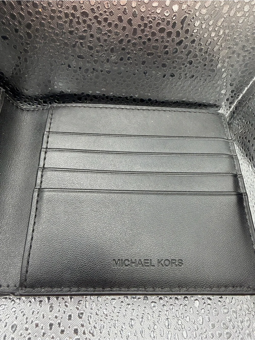 Michael Kors Black Textured Leather Bi-Fold Wallet with Gold Logo